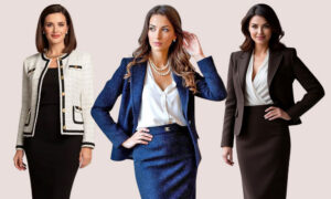 Three women modeling professional attire: cream tweed blazer over a black dress, a blue textured suit with white blouse, and a dark brown suit with a white blouse (left to right).