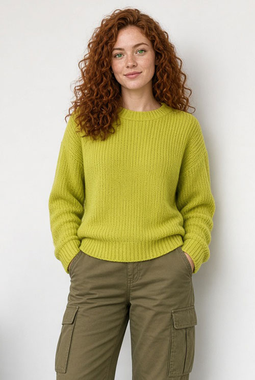 Chartreuse green knit sweater paired with moss green khaki pants